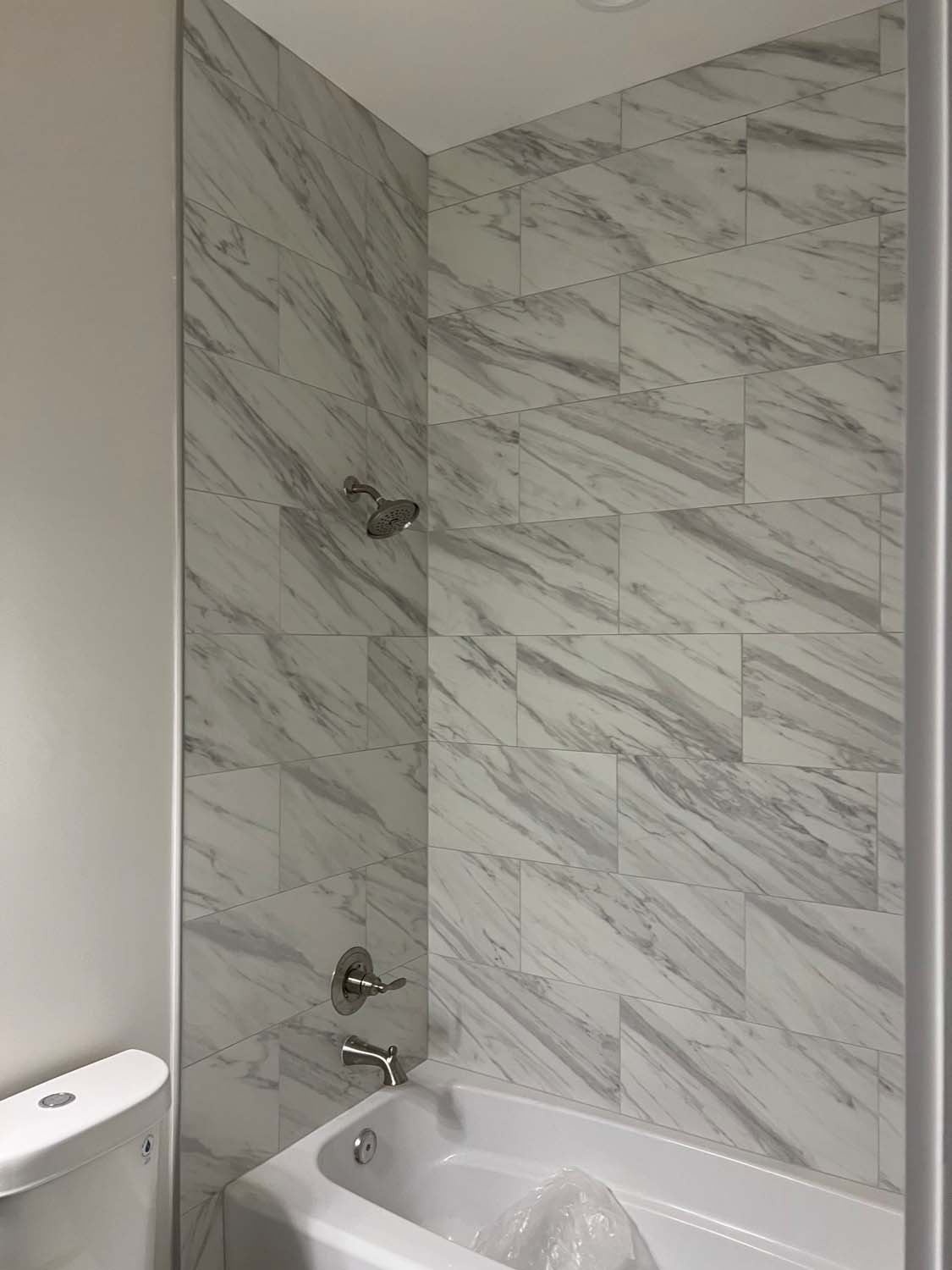 Marble-look tub and shower surround
